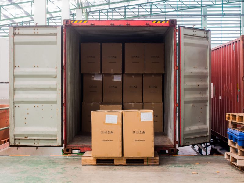 The cartons with loading out of container